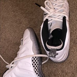 White and black nike foams